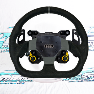 Volant Racing : compatible multimarque, plug & play pour véhicules réels.